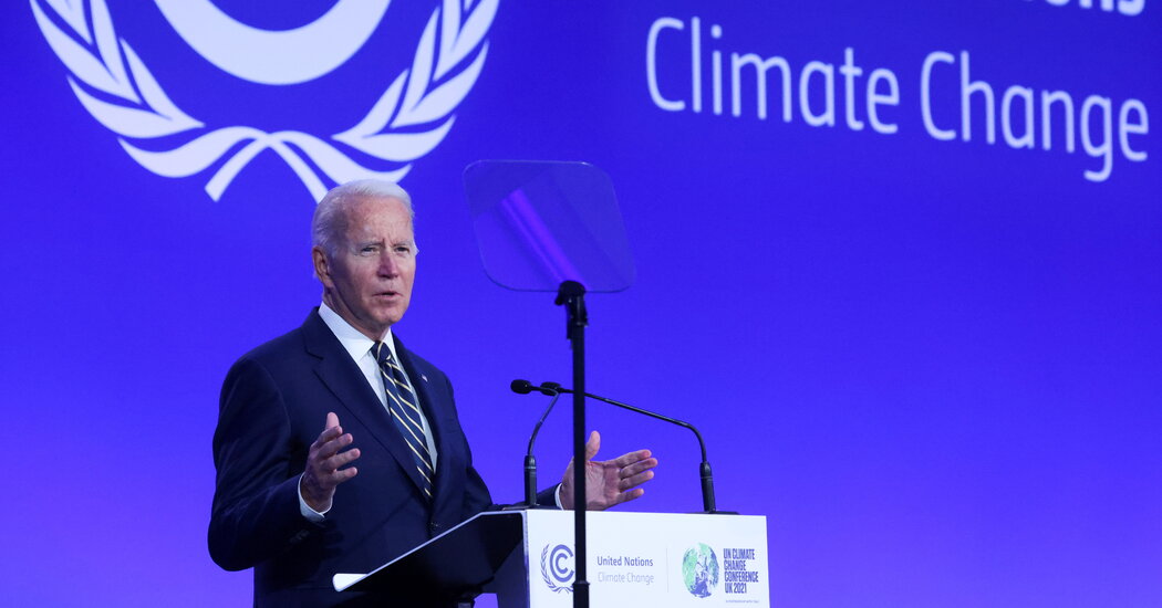 Biden calls for tougher action on emissions and promises job gains worldwide.