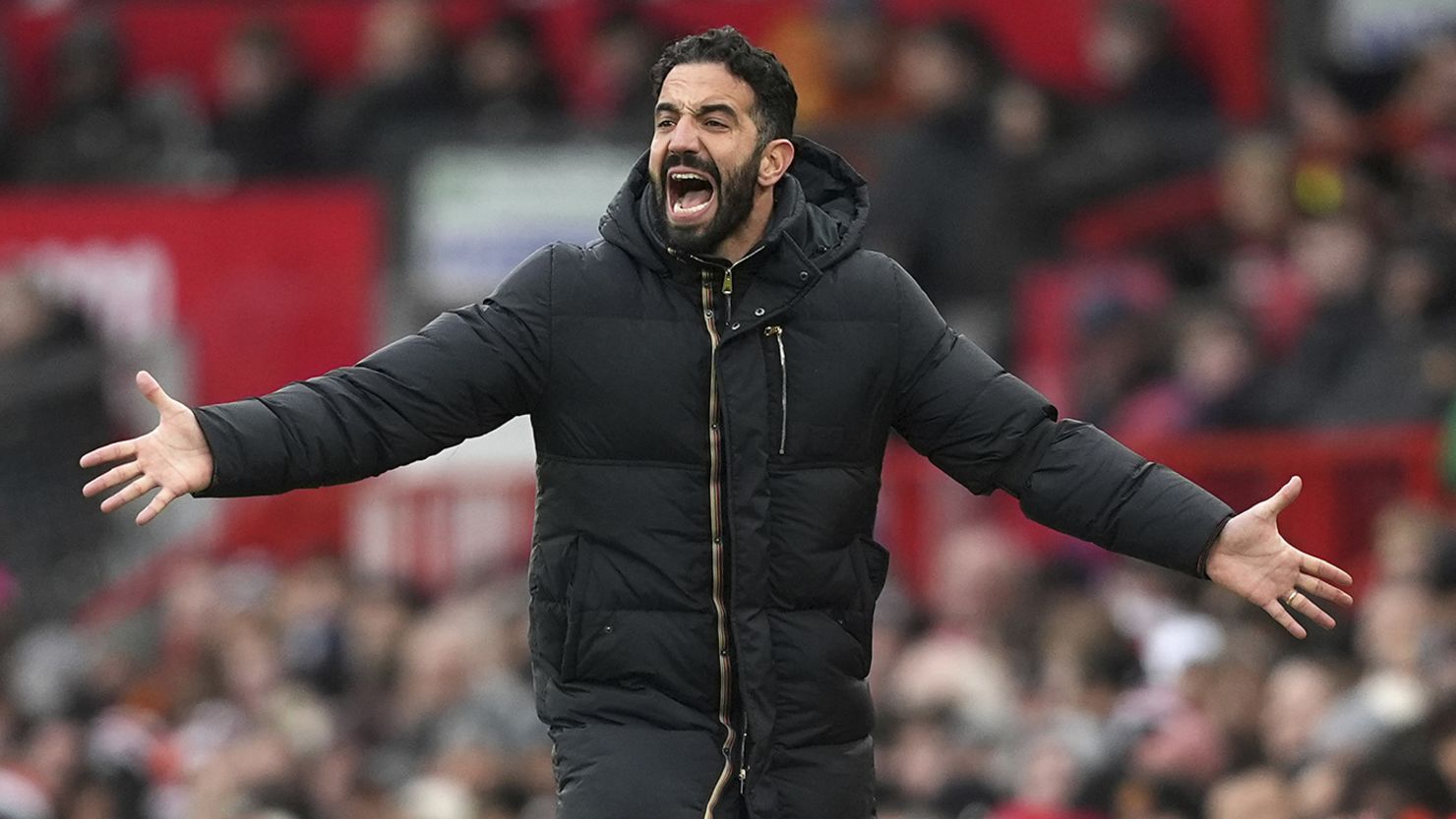 Manchester United manager Ruben Amorim gestures passionately on the touchline during a Premier League match