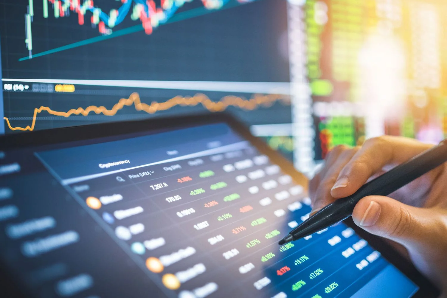 Trader reviewing forex broker promotion terms on a laptop