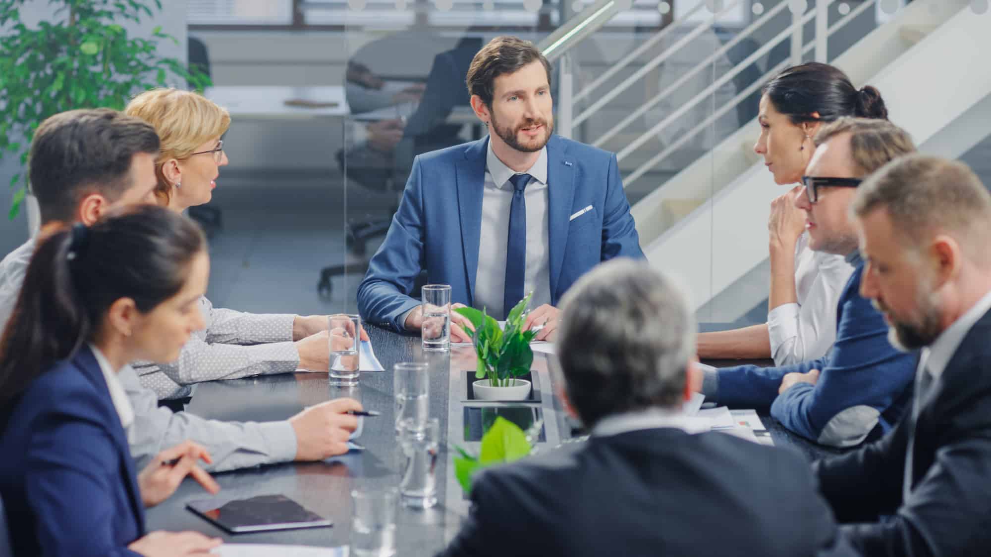 Business leaders discussing AI innovation and M&A strategy