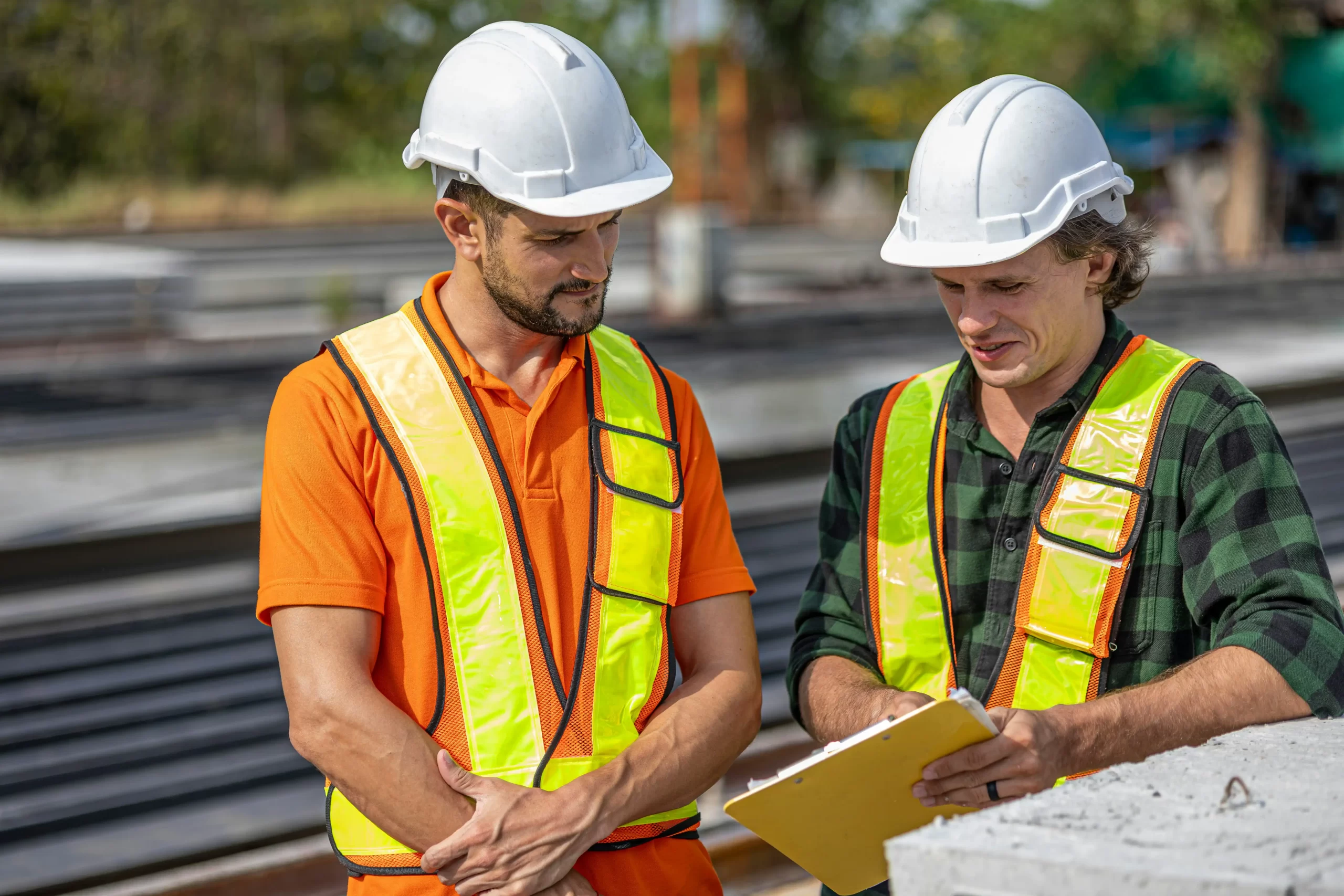 Subcontractor reviewing construction cash flow and project financing documents
