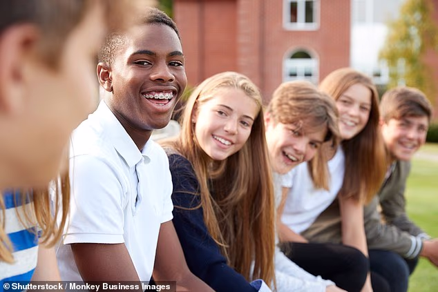 Teachers hamper boys' chances of getting into a top university because they underestimate their grade predictions, a study has suggested (file picture)