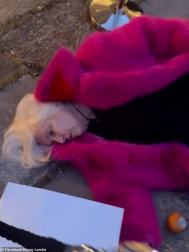 An influencer has been described as 'sick' for posting a video mocking Ann Widdecombe's murder next to an art exhibit showing an elderly woman lying 'dead' on the ground