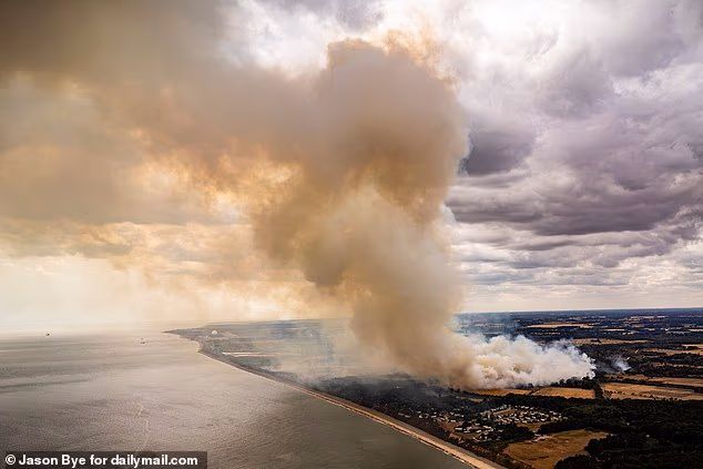 This morning Suffolk Fire and Rescue Service said the blaze at Dunwich Heath, Suffolk covered around 24 acres, but by midday this had increased to the size of 140 football pitches, or 247.1 acres