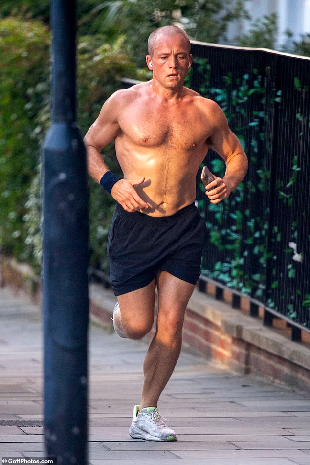 Taron Egerton brushed off his recent split from Brooks Nader as he went for a shirtless jog during London's heatwave on Tuesday