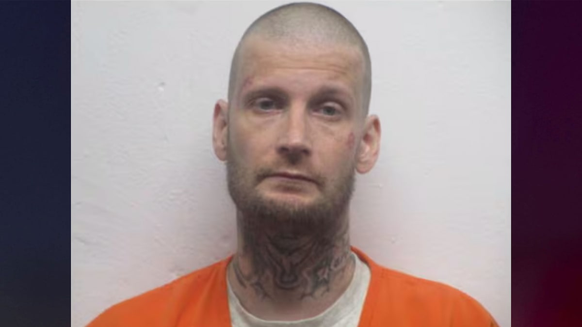 Wanted sex offender found hiding in secret compartment at home where woman was recently found dead
