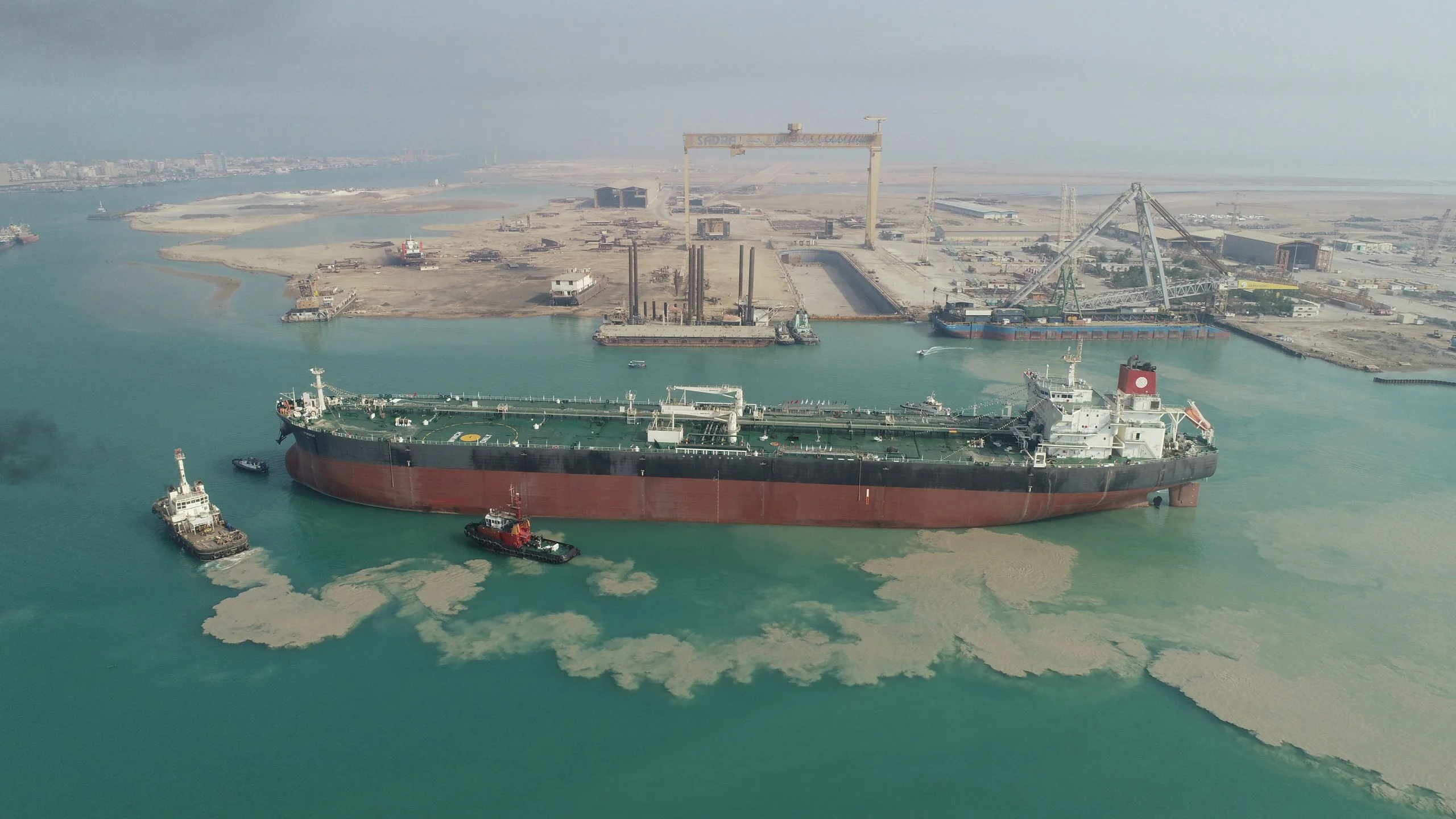 Oil tanker travelling through the Strait of Hormuz during rising tensions between Iran and the United States