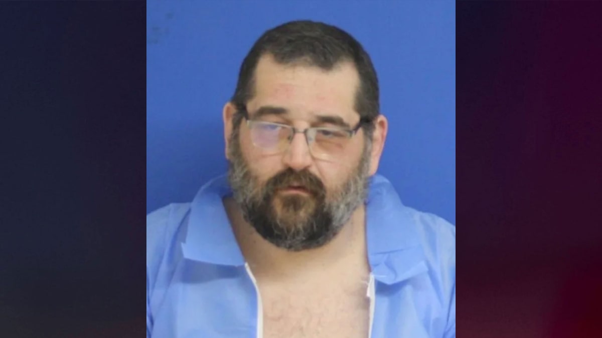 Dad sentenced to 60 years in prison for beating 12-year-old son to death with baseball bat after hearing voices