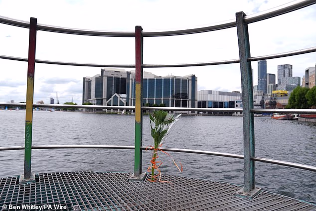 A bunch of flowers has been left at Millwall Outer Dock following the death of 14-year-old Banta Sillah