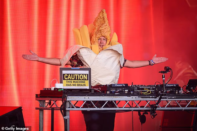 Fatboy Slim was upping the ante to close Camp Bestival in Dorset on Sunday as he dressed up as a massive bag of fish and chips