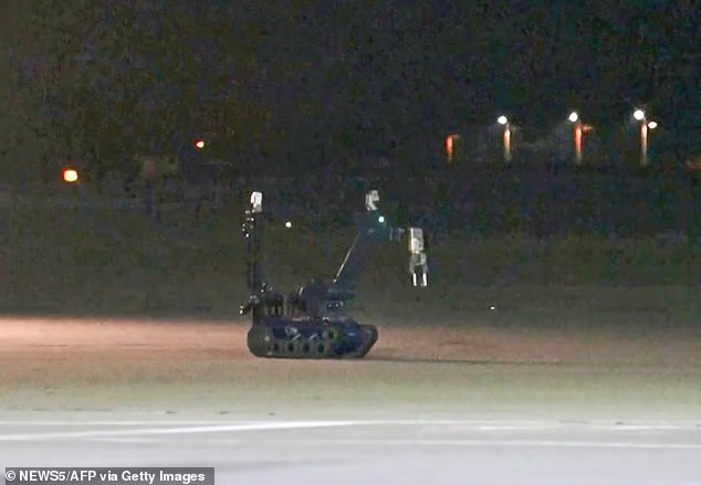 A bomb disposal robot deployed by police at German airport Leipzig-Halle after a drone was found near a Ukrainian plane