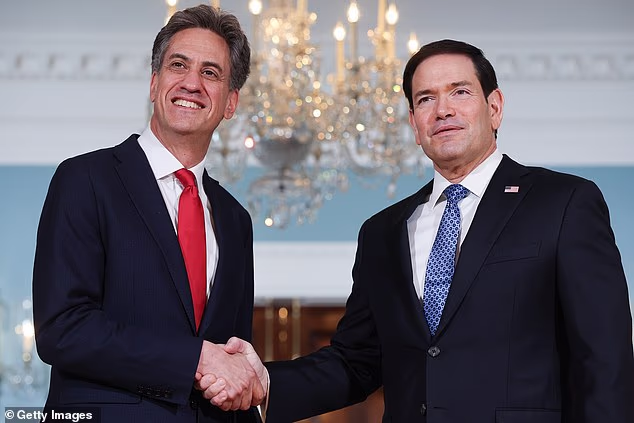 Ed Miliband today awkwardly dodged questions over whether he still thinks Donald Trump is a 'racist' and a 'misogynist' as he met his US counterpart.
