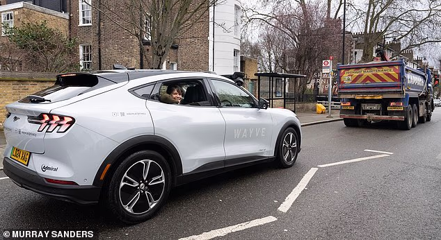 Uber's Wayve robotaxis have been granted a licence to hit the roads of London this summer - but there will need to be a qualified driver behind the wheel at all times (Stock Photo)