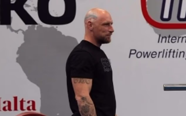 Powerlifting assistant Ernestas Kusinas (above) is under police investigation in Lithuania after claiming he deliberately sabotaged a Black athlete's squat attempt because he is 'racist'