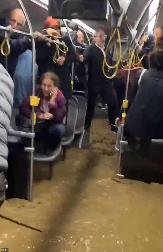 Footage captured the chaos the deadly downpours unleashed, showing passengers who were forced to stand on bus seats as floodwater rose through the vehicle