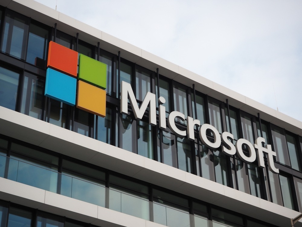 The Microsoft logo displayed on the side of the company’s office building, representing its global technology presence.